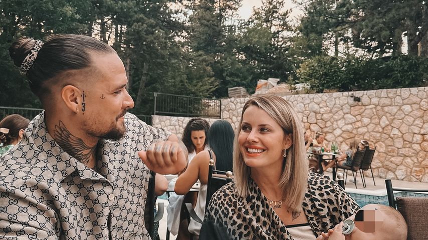 Zico Banach und Pia Tillmann mit Söhnchen Pepe